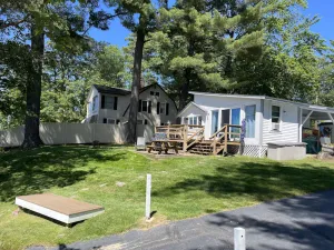 Image of Lakefront Winnisquam Cottage with dock & boat ramp