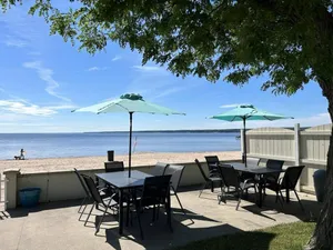 Image of 3 BR on shared beachfront property with beachfront access\/patio seating!