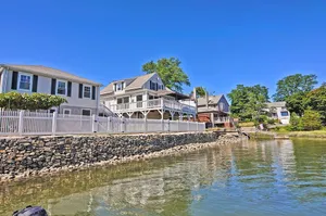 Image of Afternoon Delight: Toast the beauty of the river from the waterfront deck