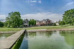 Image of Goose House: spacious lake home with heated pool, game room, private beach on Cayuga lake