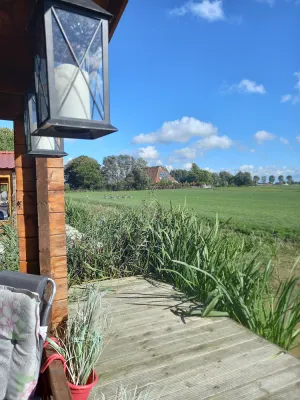 Image of Farmguesthouse jetske, located at a dairy farm with a view and a private jacuzzi.