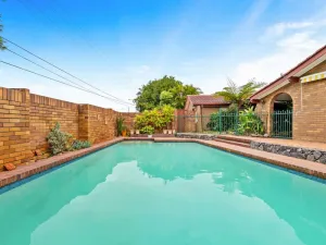 Image of Modern Comfort Retreat 4Bed Cozy Haven w Pool