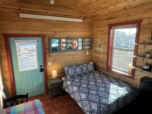 Image of The Turquoise Door at Triple View Tiny Houses