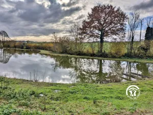 Image of Charming 16th-Century Cottage with Private Lake near Laval