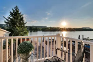 Image of Waterfront condo with large decks and a dock for summer fun centrally located.