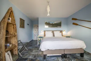 Image of Comfortable guest room with terrace in character guest house.