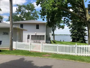 Image of Family Waterfront Lakehouse with Large Side Yard and Picture Perfect Sunsets!