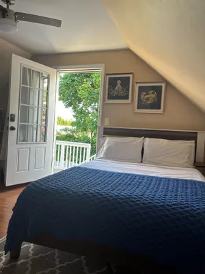 Image of \"Serene Retreat near JFK: Private Balcony, Yard, and Pool Access\"