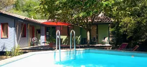 Image of House all in wood and in color, with private swimming pool and garden classified ***