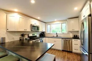 Image of Eville Creekview Townhome SKI BIKE GOLF w\/ Hot tub