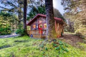 Image of Quaint cottage in the woods 75 yards to the beach - dog-friendly, firepit & WiFi