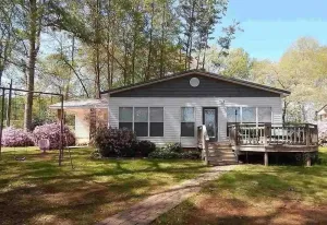 Image of Lakefront home- 3 slip boathouse-Large yard