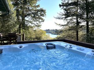 Image of Chetco Riverview! Private! Rejuvenating Hot Tub! King Bed!