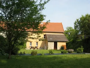 Image of Charming House with Garden, Fireplace, and Modern Amenities in Peaceful Countryside Setting