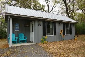 Image of Paradise Point Cottage tucked in a shady relaxing setting.