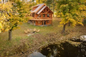 Image of Authentic Adirondack Log Cabin with a Pond View