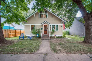 Image of 2-story downtown home near the water with firepit, enclosed backyard, fireplace
