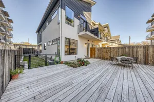 Image of Dog-friendly, two story condo w\/deck and outdoor dining area -near downtown