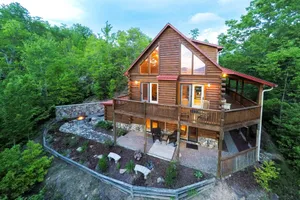 Image of Large cabin with wrap-around porch, fireplace & wet bar