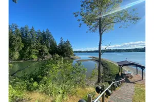 Image of Private Peninsula Waterfront Home by Nature Preserve