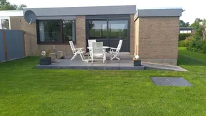 Image of Chic bungalow (renovated in 2018) directly on the dike to the IJsselmeer \/ beach