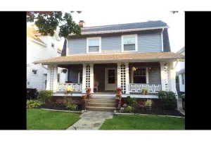 Image of Dutch colonial Century home Charm