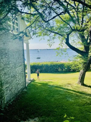 Image of Beautiful Lakeside Stone Mansion w Massive Waterfront & all the toys and views