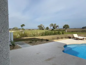 Image of 2 BEDROOM SUITE (SEPARATE FROM MAIN HOUSE) POOL, MARSH, GOLF AND WATER VIEWS