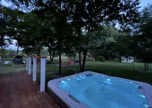 Image of Tranquil River cottage w\/hot tub, firepit , mins to a 18-holes golfing & fishing