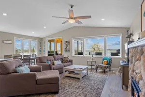 Image of Cozy, year-round lake home with magnificent sunset views, lake access and dock.