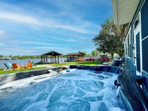 Image of Waterfront Cabin with Hot Tub, Outside Bar & Private Dock!