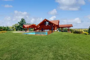 Image of Grand cabin with lake view, pond, wood fireplace & AC, & fast WiFi