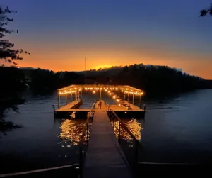 Image of Lakefront with 2-Tier Dock & Jet Ski Dock, Boat Lift, Pool Table, Kayaks, Tubes