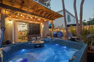 Image of Hot Tub~Fire Pit~Beach 2 Min Walk~Game Room~Rooftop Launch Viewing