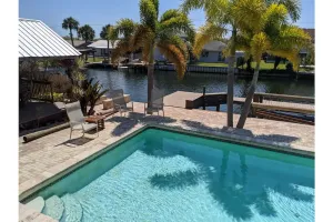 Image of Waterfront 4 bed 3 bath steam sauna pool tiki bar Heated Pool to 70 Hot Tub