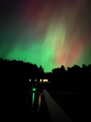 Image of Burt Lake waterfront - huge dock, fire pit and incredible views