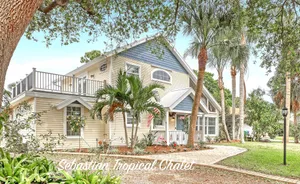 Image of Tropical Chalet w\/ 3 King Bedrooms. 3 patios, and an Above-Ground Pool!