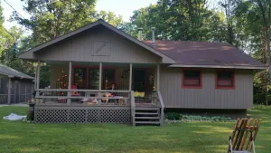 Image of updated cottage & nearly and acre of land with lake access