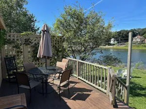 Image of River Watch: Waterfront home with river views and a private dock.