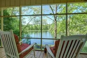 Image of Waterfront cabin in the mountains. Peaceful, relaxing setting.