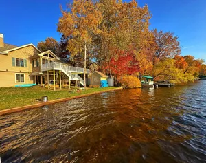 Image of Lake House with great fishes and swimming near Grand Rapids