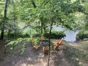 Image of Riverfront 3 bedroom 3 bath cabin, soothing rapids, on tubing path, river entry