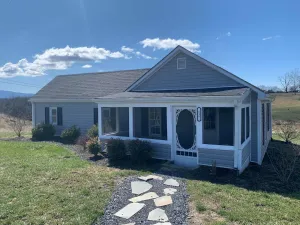 Image of Country cottage beside stocked pond on 40 acres and Blue ridge Mountain View