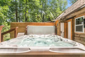 Image of lake house, with hot tub, relaxing getaway on the lake, your home away from home