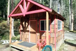 Image of Cabin and adjacent tent site