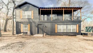 Image of This is a unique home made out of shipping containers right near the lake.