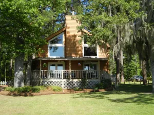 Image of Log Cabin Home * Fantastic Sunsets! * Private Boat Ramp * Big Water * Fiber Wifi