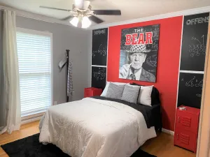 Image of Alabama themed home with fenced yard and courtyard