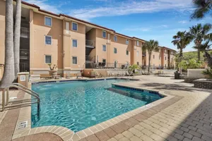 Image of 3 BR Condo 2 Pools and Hot Tub Walk to Beach