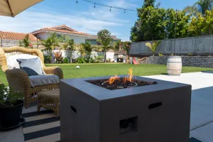 Image of Large turf yard, putt putt, soccer net, fire pit, gas grill & more!